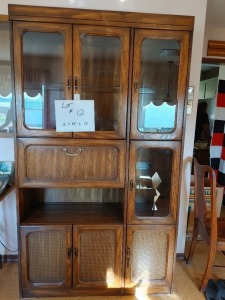 China cabinet, 16 x 45 x 75. This unit has a light in the top section and 1 shelf that opens