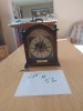 Antique style clock with key to wind up