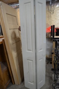 Bifold Door, 24"w x 80"h, has a hole in the back