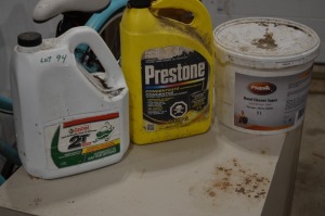 Jug of Preston Antifreeze (concentrated), Jug of Castrol 2 Stroke Oil (still sealed)